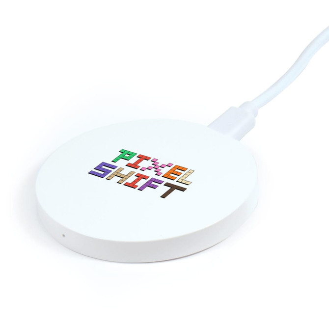 A round white wireless charger with a cable, featuring colorful text and a logo on the surface.