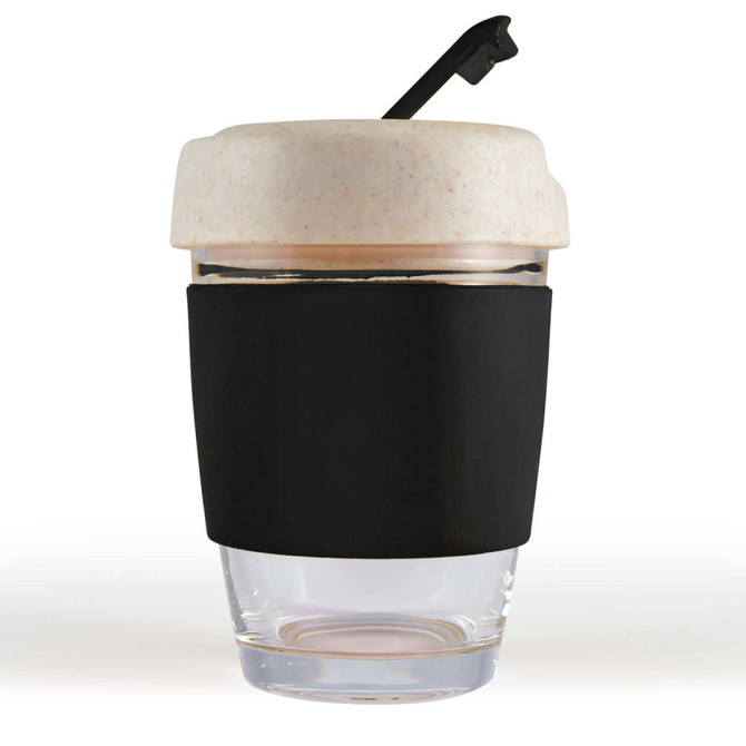 A reusable coffee cup featuring a transparent body, a beige lid with a straw, and a black silicone band for grip.