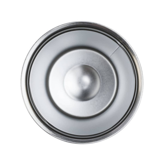 A stainless steel coffee cup with a smooth interior and circular base, reflecting light. It has a simple design.