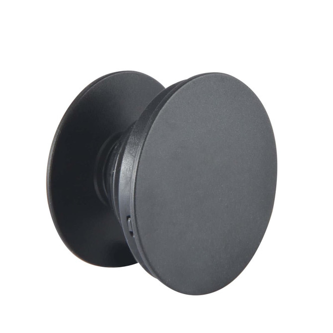 A black phone grip with a circular design, featuring a smooth surface and a branding logo.