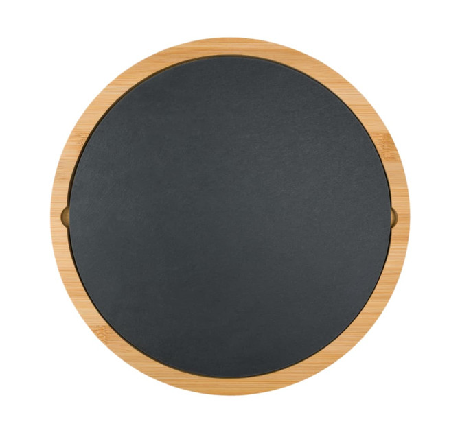 A round cheese board with a natural bamboo edge and a black slate surface. It features two handles.