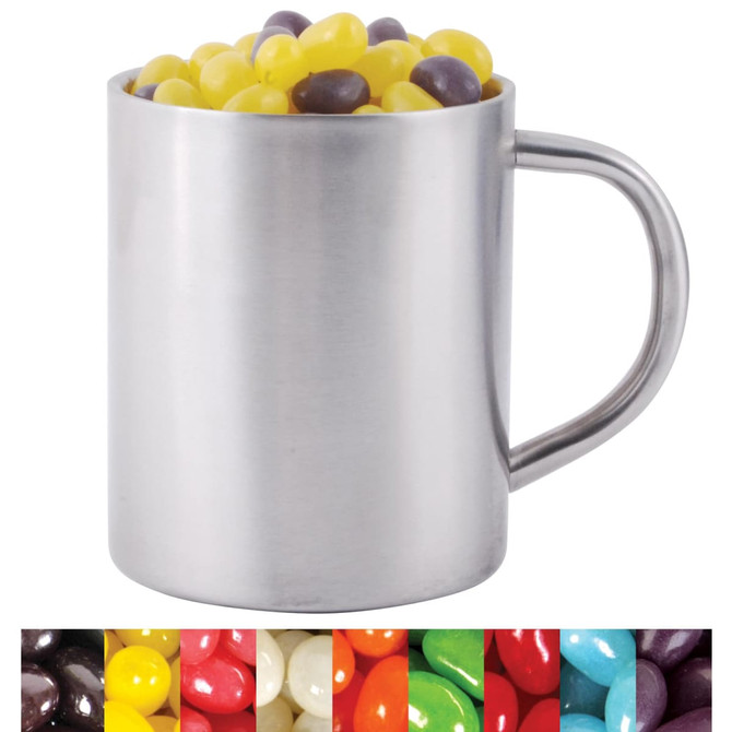 A silver mug filled with assorted jelly beans in vibrant colors, including yellow and purple.