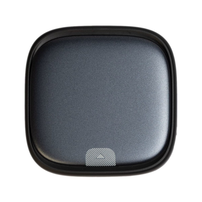 A grey retractable cable set in a sleek, square case, featuring a logo on the front.