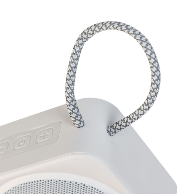 A white mini speaker with a grey braided handle and control buttons on top. It features a logo on the side.