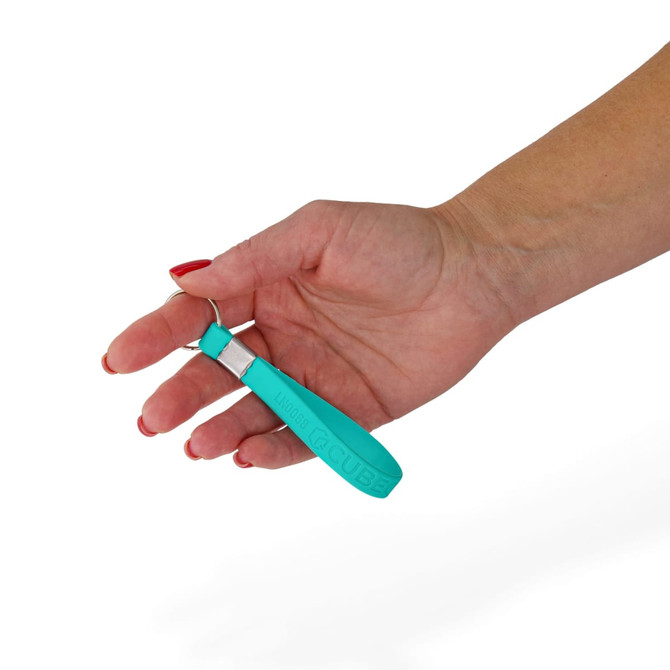 A hand holding a turquoise silicone strap keytag equipped with a metal keyring.