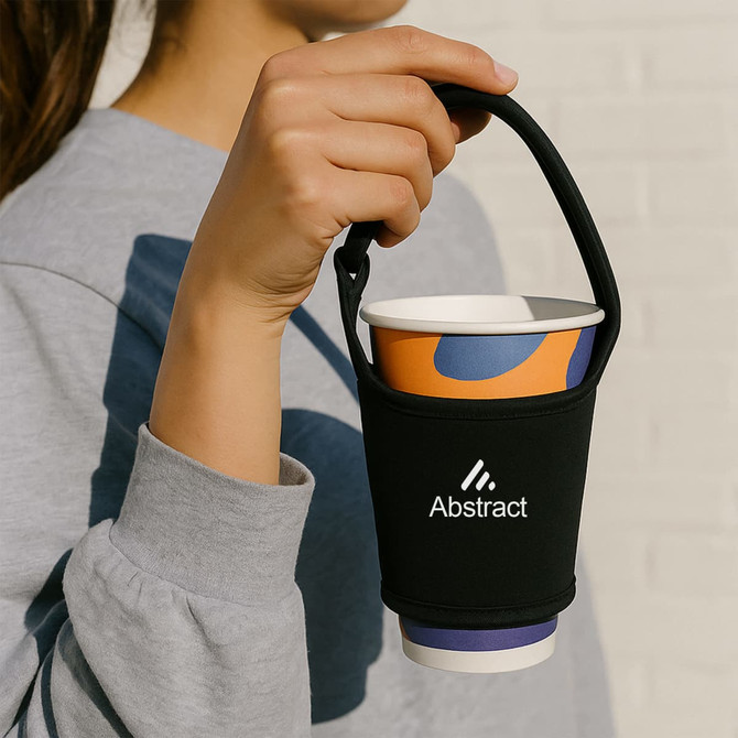 A cup pouch sleeve in black holding a multi-coloured drink cup, featuring a logo on the front.