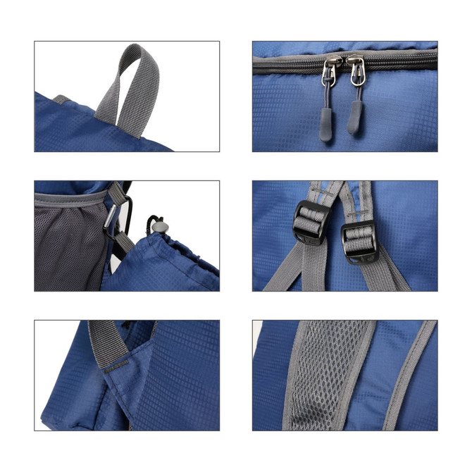 A packable travel backpack in navy blue with grey accents, featuring zippers, straps, and mesh detailing.