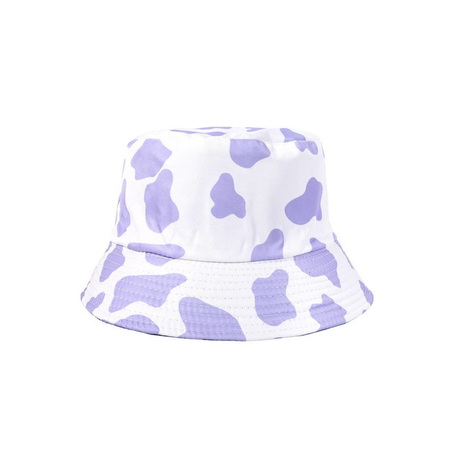 A bucket hat featuring a white base adorned with purple cow print patterns and a striped brim.