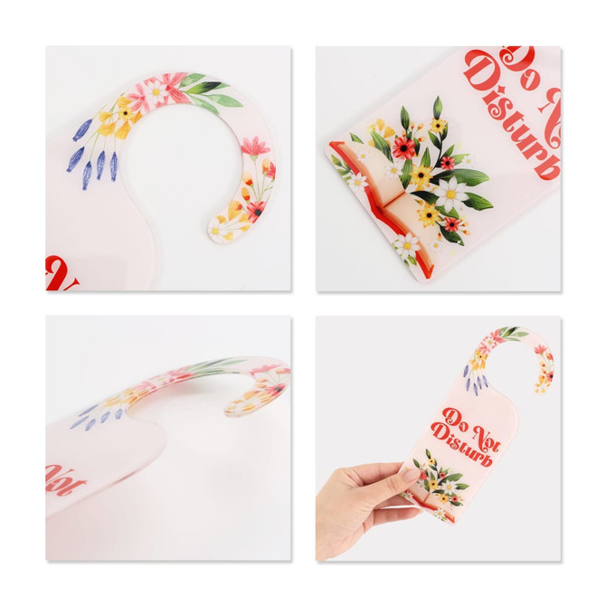 A custom-shaped acrylic door hanger featuring a floral design in pink, yellow, and blue with a handle for easy hanging.