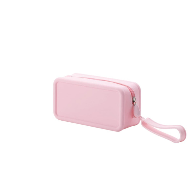 A pink silicone square cosmetic bag with a zip closure and a wrist strap. Features a branding logo.