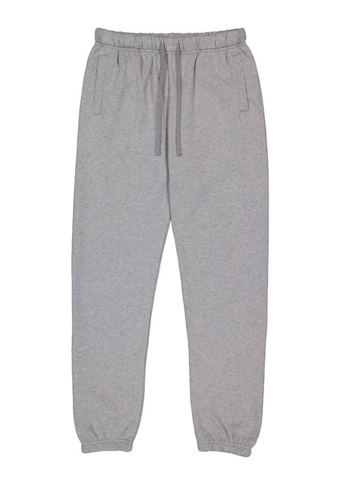 A pair of light grey women's track pants with an elastic waistband and drawstring, featuring side pockets.