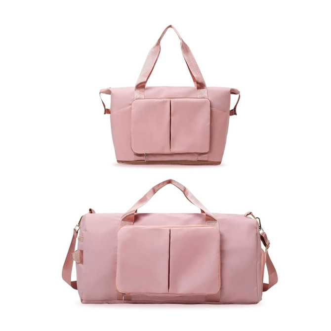 A foldable sports duffle bag in pink featuring double handles, a detachable shoulder strap, and front pockets.
