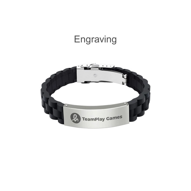 A black silicone bracelet featuring a metal clasp and engraved silver plate, with a logo present.