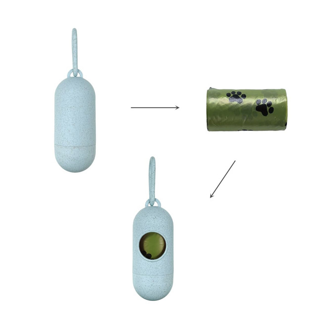 An eco-friendly, light blue capsule-shaped pet waste bag dispenser with a green roll of bags featuring paw prints inside.