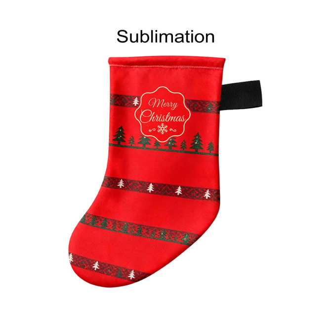 A red Christmas stocking featuring festive patterns, trees, and a decorative label, with a hanging loop.
