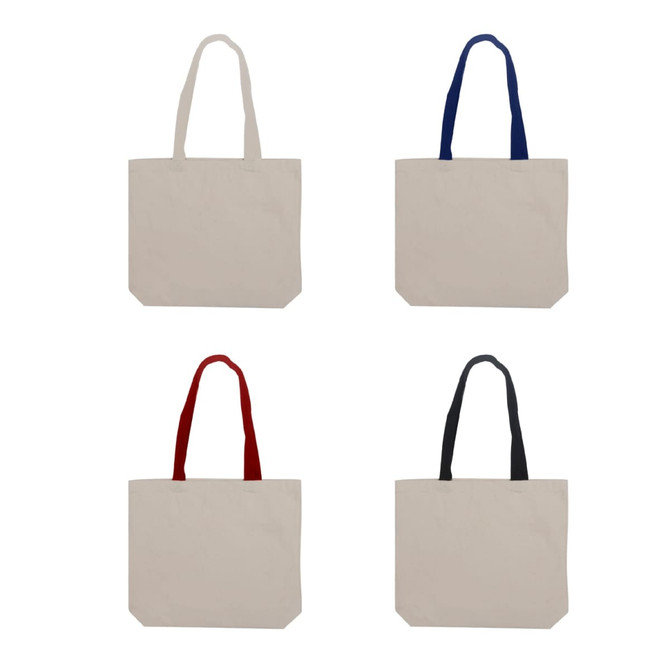 Four canvas tote bags in beige, featuring handles in navy, red, and black, with one bag displaying a logo.