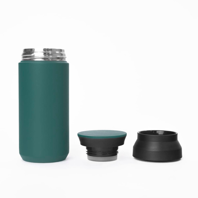 A drink bottle in deep green with two interchangeable lids, featuring a sleek, smooth design.