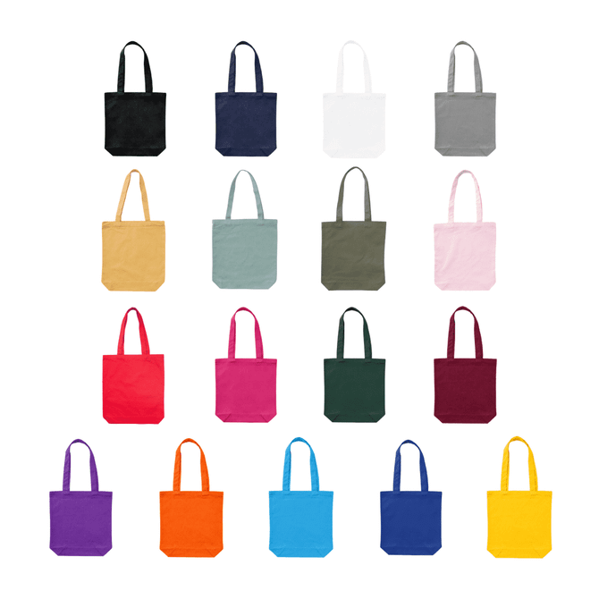 A collection of colourful tote bags in various shades, including black, navy, white, grey, yellow, green, pink, and more.