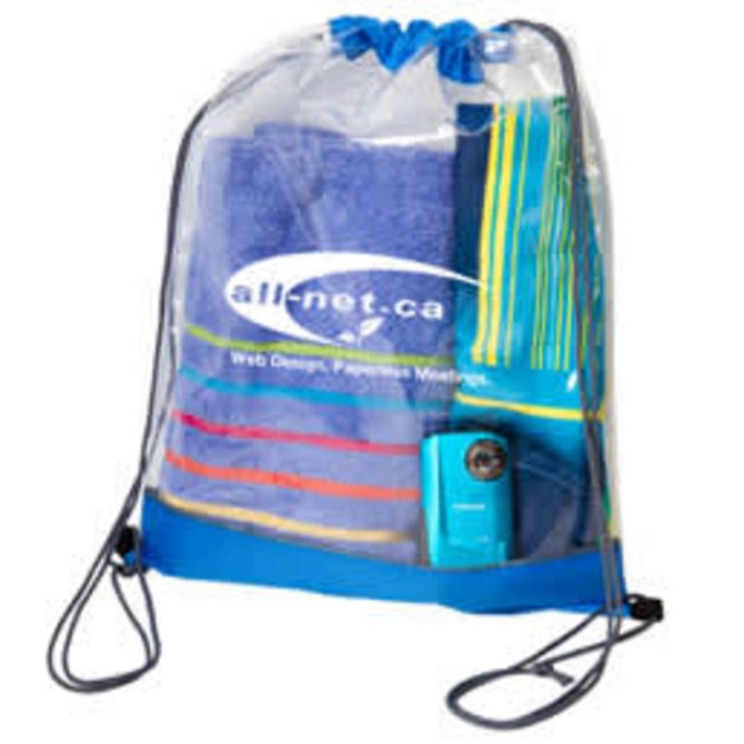 A clear PVC drawstring bag containing a towel, a beach blanket, and a blue electronic device, featuring a logo.