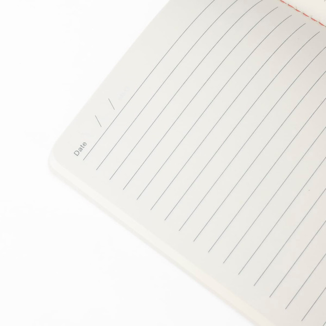 An open A5 thin PU cover notebook featuring lined pages and a section for the date, with a clean, minimalist design.
