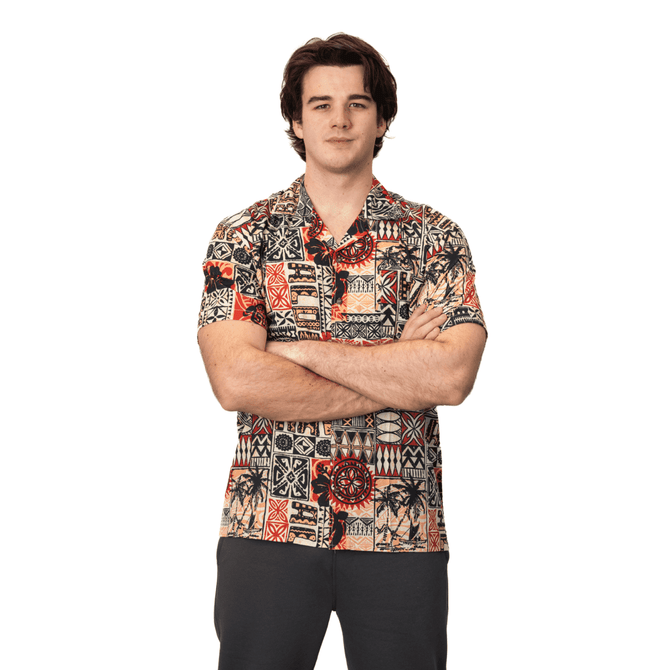 A short-sleeved button-up shirt featuring a colourful, patterned design with various motifs. The shirt has a logo.