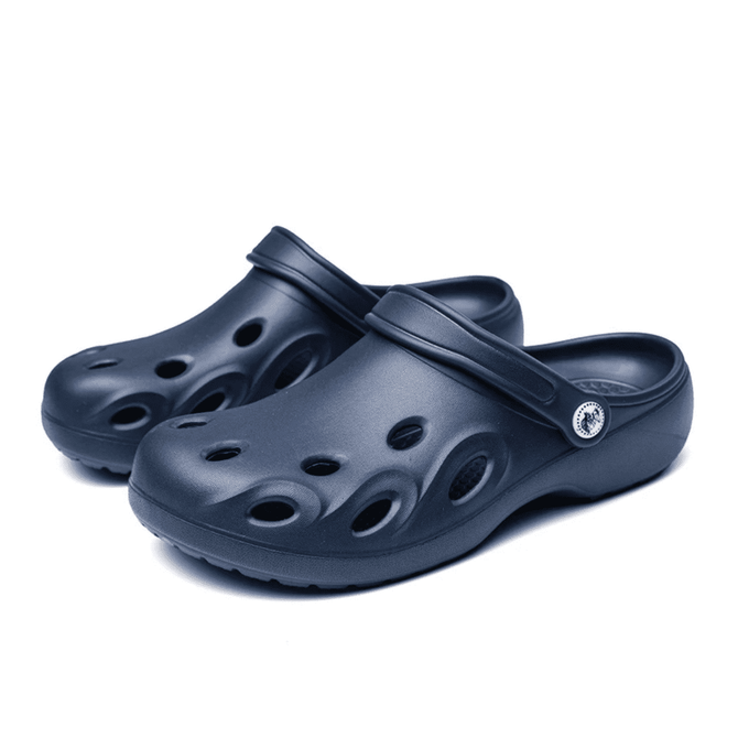 Navy blue clog slides with ventilation holes and a swivel strap, accompanied by a logo.