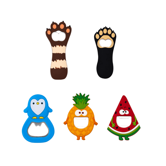 A collection of custom shaped PVC bottle openers in various colours: raccoon, paw, penguin, pineapple, and watermelon.