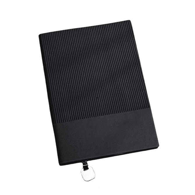 A black A5 leather notebook with a ribbed texture and a small clasp. It features a logo on the cover.