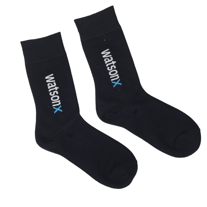 A pair of black socks featuring a logo in white and light blue. The socks are ankle-length.