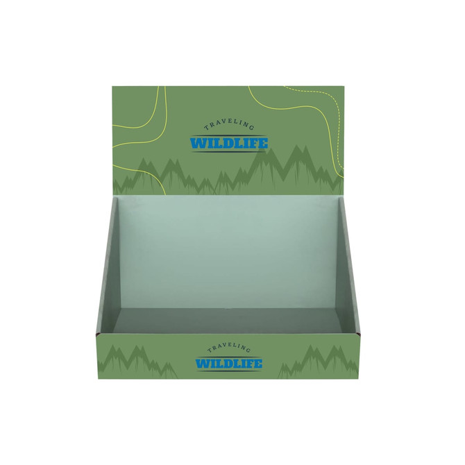 A green corrugated cardboard counter display with a mountain and travel theme. It has a branded logo on the front.
