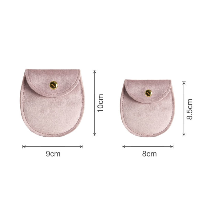 A pink oval velvet jewelry pouch with a golden snap closure, featuring two sizes displayed alongside each other.