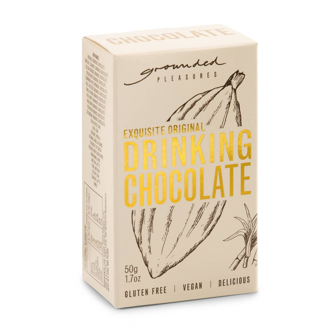 A package of drinking chocolate in cream and beige, featuring a logo and a sketch of cocoa pods.