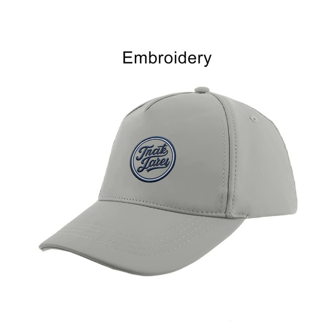 A light grey PU leather baseball cap with an embroidered logo. Features a curved peak and adjustable strap.