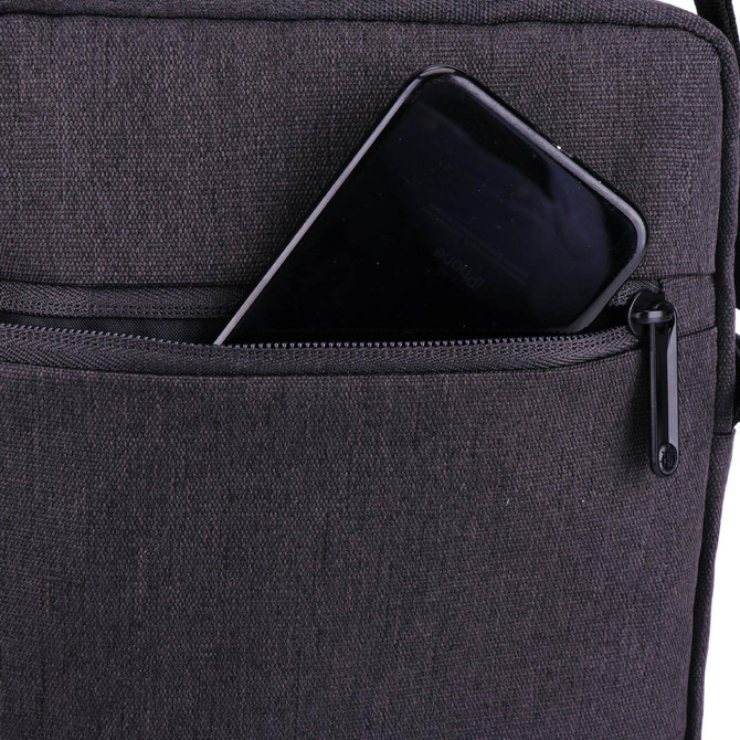 A black shoulder bag featuring a zippered pocket with a smartphone partially visible. The bag has a simple, sleek design.
