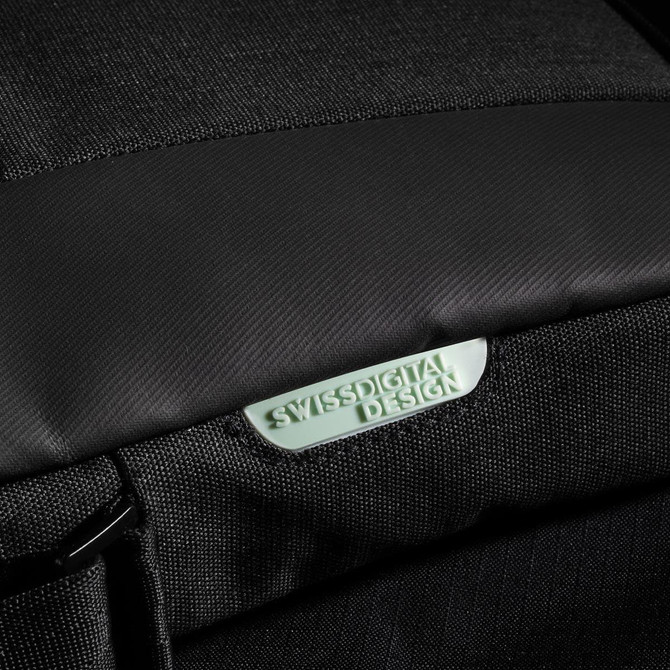 A close-up of a black Swissdigital Arosa Shoulder Bag featuring textured fabric and a logo on the front.