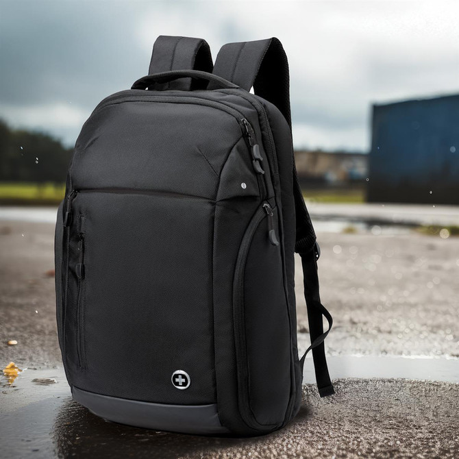 A black backpack with multiple compartments and padded straps, featuring a logo on the front.