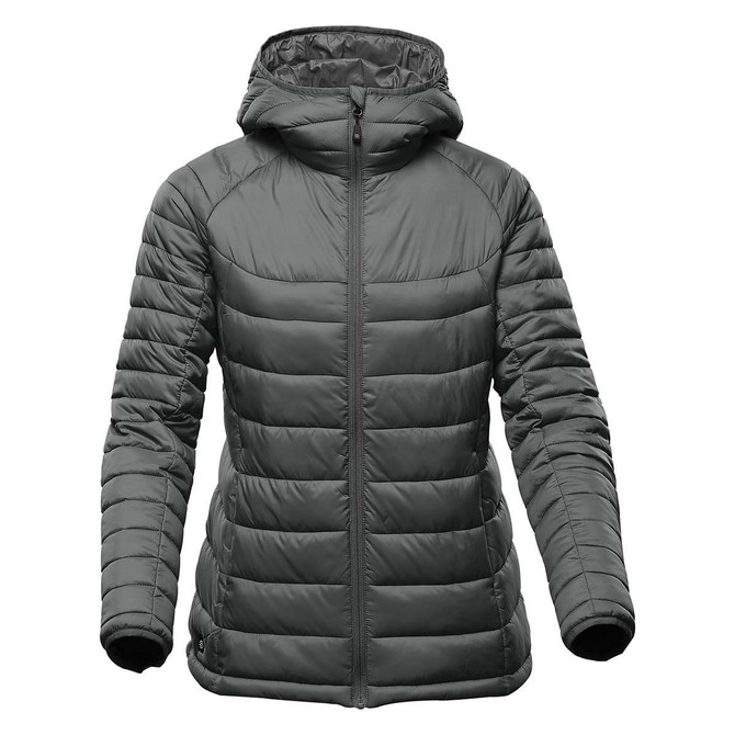 A women's thermal jacket in dark green with a hood, featuring a zip front and quilted design. It has a logo on the sleeve.