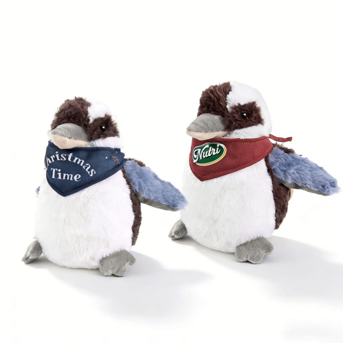 Two plush Kookaburra toys with brown and white fur, one wearing a blue bandana and the other with a red bandana, each having a logo.