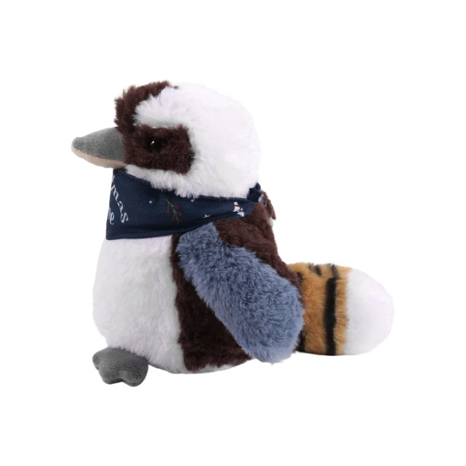 A Kookaburra plush toy in brown, white, and blue, wearing a dark blue bandana. It has a rounded shape and soft texture.