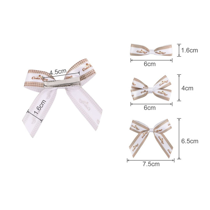 A set of hair clip bows in white and brown, featuring various sizes and styles with a silver clip.