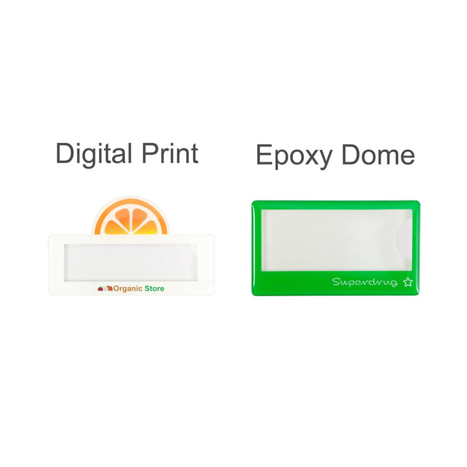 Two custom reusable acrylic name badges: one in white with an orange design and one in green with a simple shape.