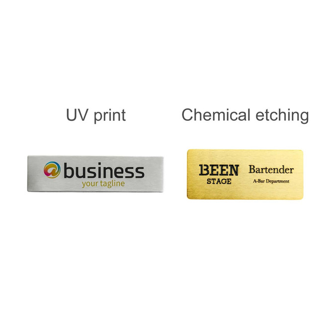 A metallic name badge with a silver finish on one side and a gold finish on the other, featuring various designs and logos.