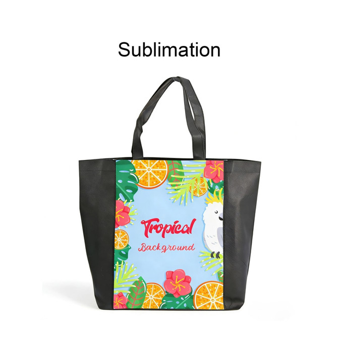 A tote bag with a full-colour tropical design featuring fruits and a bird, complemented by black handles.
