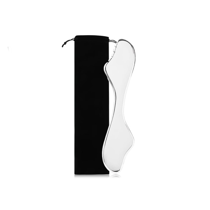 A clear massage tool in a foot shape, accompanied by a black storage pouch.
