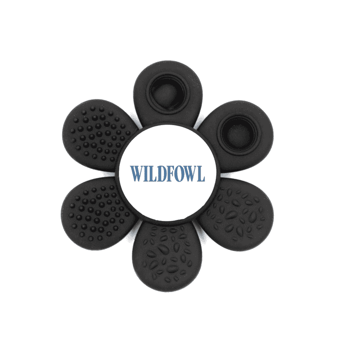A black flower-shaped product with textured petals and a central logo. It features various raised patterns on each petal.