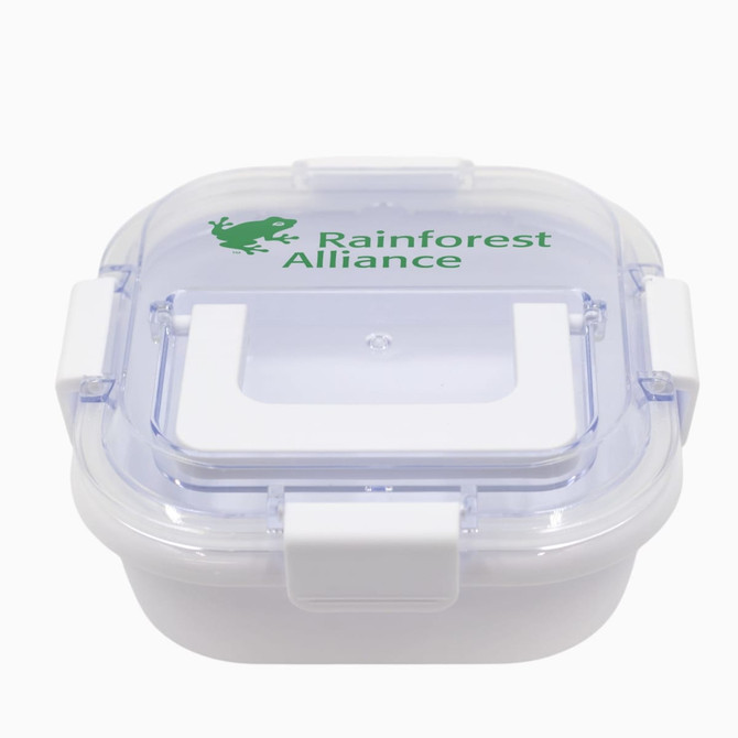 A clear plastic lunch box with a white lid featuring a handle and a logo.
