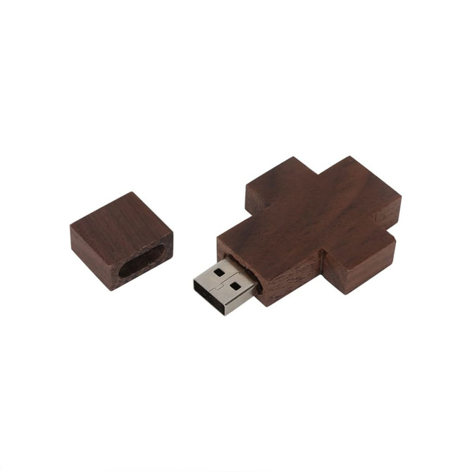A wooden flash drive shaped like a cross, featuring a removable cap and a metallic USB connector.