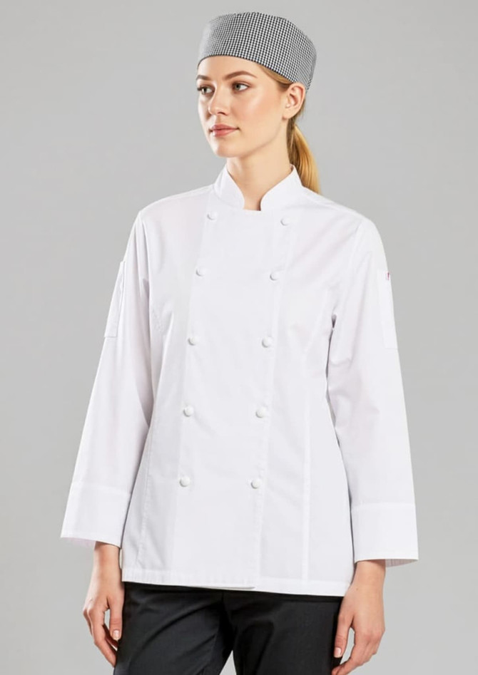 A white long sleeve chef jacket worn by a woman, paired with a grey checkered chef hat. The model is facing forward.