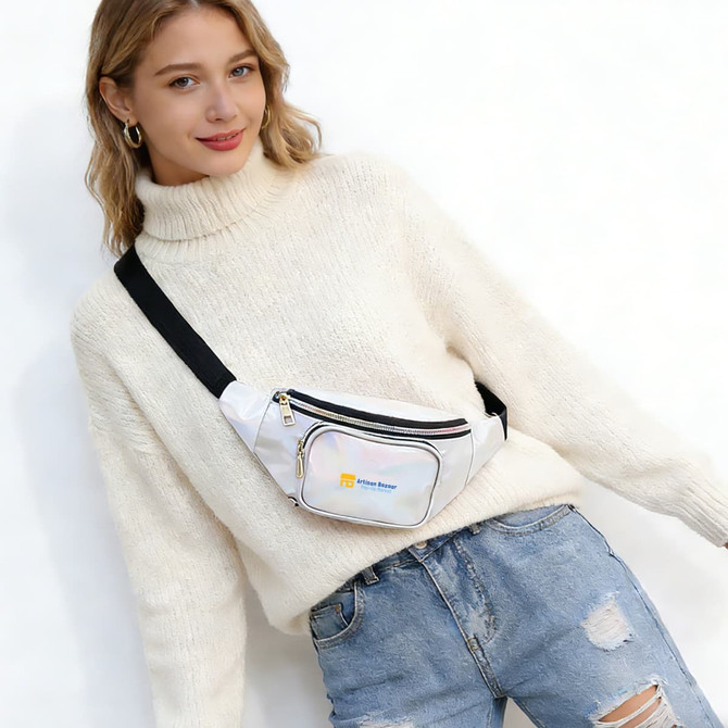 A holographic fanny pack in white with a black strap, featuring a small logo on the front.