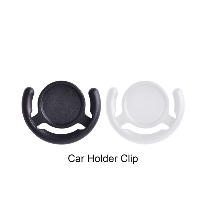 A black and a white phone pop holder car clip, featuring a circular centre and curved grips for attachment.
